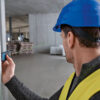 High-visibility green laser beam active on a Bosch GLM 50-27 CG professional measure.
